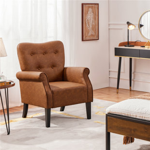 Leather armchair and on sale ottoman set